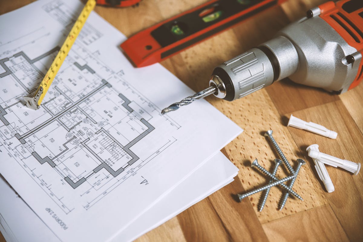 General contractor reviewing blueprints and plans for Palm Beach County commercial project